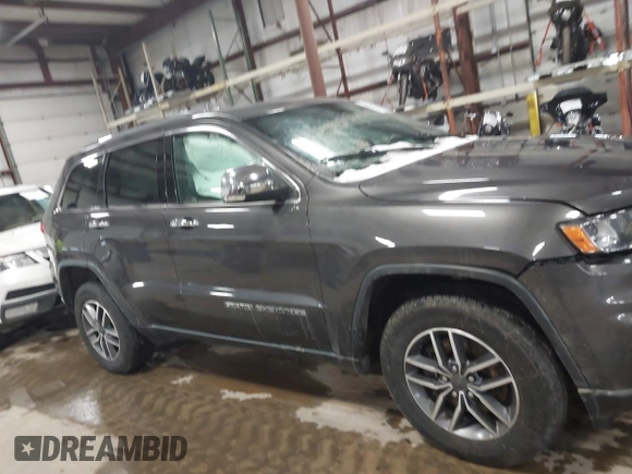 2021 Jeep Grand Cherokee 80th Anniversary with VIN 1C4RJFBG7MC513588, listed as a IAAI auction lot 41441227 with 49,143 mi miles and . Bid and sale history available at DreamBid. Image 13.