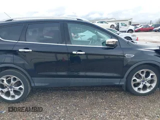 2016 Ford Escape Titanium with VIN 1FMCU0JX8GUA49619, listed as a IAAI auction lot 41743116 with 53,456 mi miles. Bid and sale history available at carsss.com. Image 13.