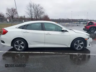 2020 Honda Civic LX with VIN 2HGFC2F66LH510069, listed as a IAAI auction lot 41860480 with 43,639 mi miles and . Bid and sale history available at DreamBid. Image 13.