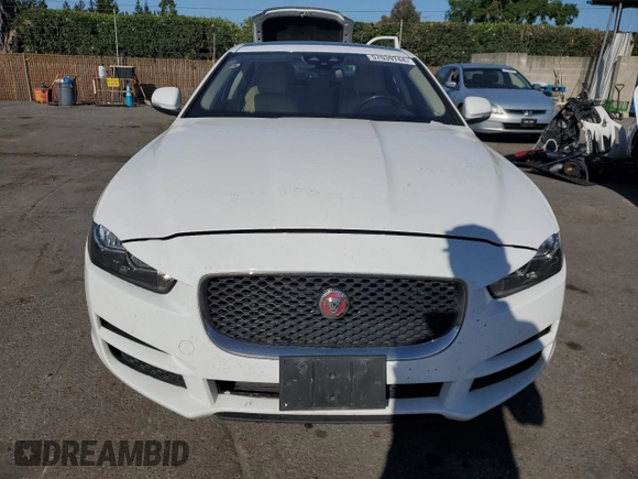 2017 Jaguar XE with VIN SAJAE4BNXHA968653, listed as a Copart auction lot 57039744 with 148,481 mi miles and Salvage Title. Bid and sale history available at DreamBid. Image 5.