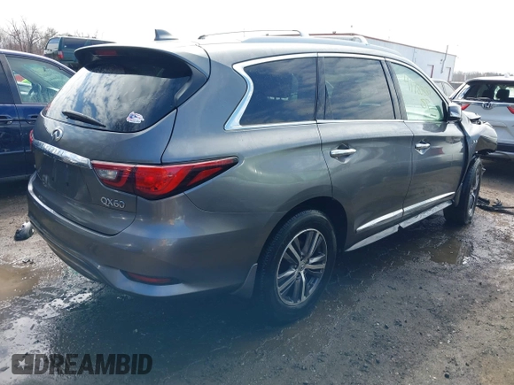 2019 Infiniti QX60 Luxe with VIN 5N1DL0MM5KC529818, listed as a IAAI auction lot 41785839 with 109,012 mi miles and . Bid and sale history available at DreamBid. Image 4.