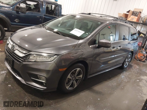 2018 Honda Odyssey Touring with VIN 5FNRL6H84JB041309, listed as a IAAI auction lot 42272247 with 90,371 mi miles and . Bid and sale history available at DreamBid. Image 19.