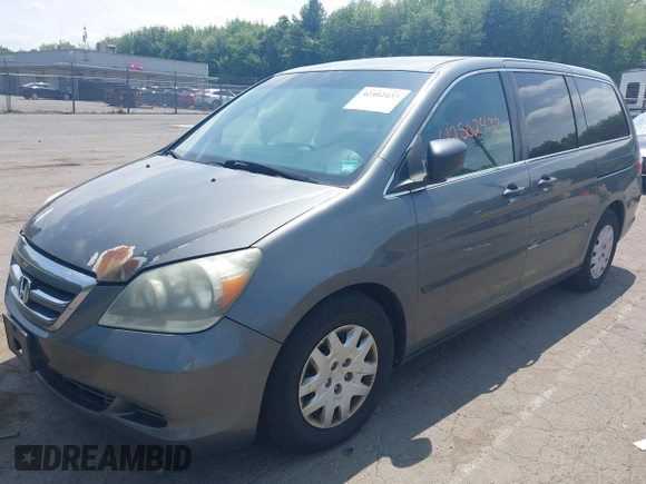 2007 Honda Odyssey LX with VIN 5FNRL38267B029066, listed as a IAAI auction lot 42502433 with 185,721 mi miles and . Bid and sale history available at DreamBid. Image 2.
