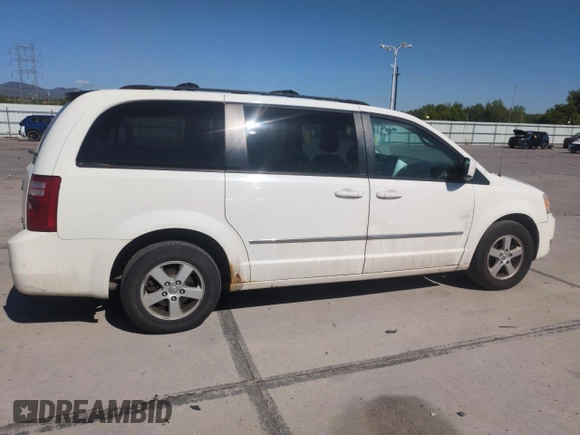 2010 Dodge Grand Caravan SXT with VIN 2D4RN5D16AR444938, listed as a Copart auction lot 56762695 with 251,437 mi miles and Clean Title. Bid and sale history available at DreamBid. Image 3.