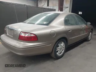2004 Mercury Sable LS Premium z VIN 1MEFM55S54G601180, wystawiony jako IAAI lot #42162460 z przebiegiem 104 613 mil mil oraz . Historia ofert i sprzedaży dostępna na DreamBid. Obrazek 4.