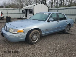 2001 Ford Crown Victoria LX z VIN 2FAFP74W81X103334, wystawiony jako Copart lot #50603315 z przebiegiem 117 900 mil mil oraz Szkoda całkowita • Salvage title. Historia ofert i sprzedaży dostępna na DreamBid. Obrazek 1.