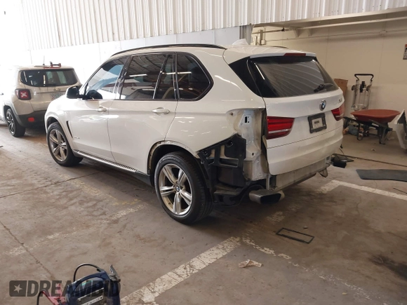 2015 BMW X5 xDrive50i z VIN 5UXKR6C56F0J76986, wystawiony jako IAAI lot #42079106 z przebiegiem 96 220 mil mil oraz . Historia ofert i sprzedaży dostępna na DreamBid. Obrazek 3.