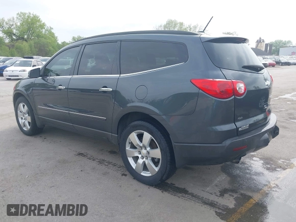 2011 Chevrolet Traverse LTZ with VIN 1GNKVLED2BJ211115, listed as a IAAI auction lot 42044255 with 275,653 mi miles and . Bid and sale history available at DreamBid. Image 3.