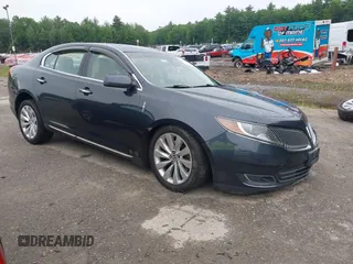 2013 Lincoln MKS with VIN 1LNHL9EK6DG617369, listed as a IAAI auction lot 42478152 with 86,874 mi miles and . Bid and sale history available at DreamBid. Image 1.