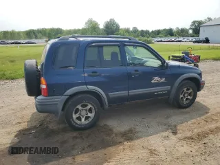 2004 Chevrolet Tracker ZR2 z VIN 2CNBJ734346903751, wystawiony jako Copart lot #59300765 z przebiegiem 126 924 mil mil oraz Szkoda całkowita • Salvage title. Historia ofert i sprzedaży dostępna na DreamBid. Obrazek 3.