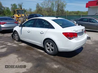 2014 Chevrolet Cruze 1LT with VIN 1G1PC5SB4E7354774, listed as a IAAI auction lot 42104388 with 136,532 mi miles and . Bid and sale history available at DreamBid. Image 3.