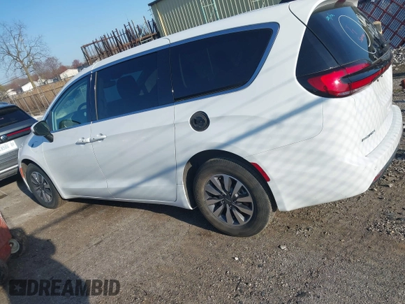 2023 Chrysler Pacifica Hybrid Touring L z VIN 2C4RC1L74PR562240, wystawiony jako IAAI lot #42060669 z przebiegiem 45 882 mil mil oraz . Historia ofert i sprzedaży dostępna na DreamBid. Obrazek 14.