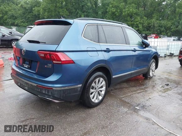 2018 Volkswagen Tiguan SEL with VIN 3VV2B7AX4JM019965, listed as a IAAI auction lot 42395783 with 107,822 mi miles and . Bid and sale history available at DreamBid. Image 4.