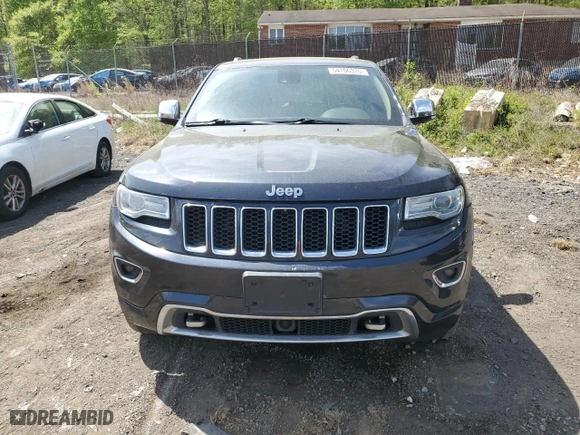 2014 Jeep Grand Cherokee Overland with VIN 1C4RJFCT1EC379867, listed as a Copart auction lot 54106375 with 217,908 mi miles and Clean Title. Bid and sale history available at carsss.com. Image 5.