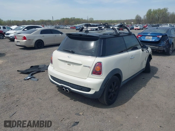 2007 MINI Hardtop S with VIN WMWMF73547TV31403, listed as a IAAI auction lot 42066433 with 156,730 mi miles and . Bid and sale history available at DreamBid. Image 4.