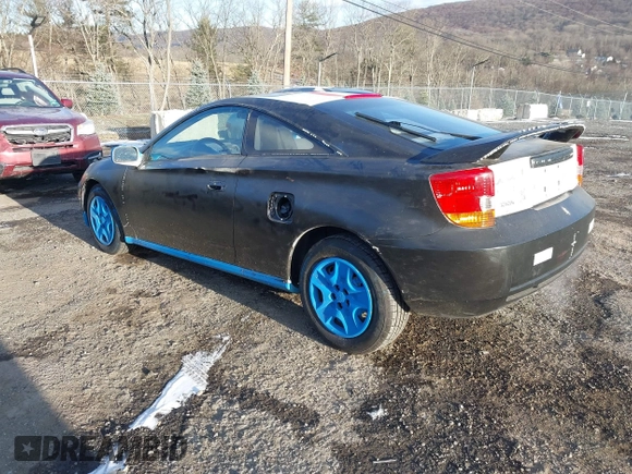 2000 Toyota Celica GT with VIN JTDDR32TXY0061397, listed as a IAAI auction lot 41264249 with 256,280 mi miles. Bid and sale history available at carsss.com. Image 3.