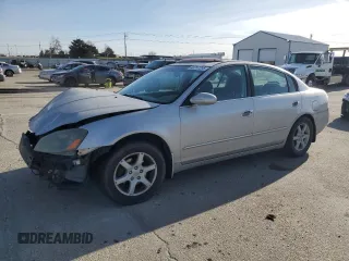 2005 Nissan Altima 2.5 S with VIN 1N4AL11D65N491211, listed as a Copart auction lot 48757295 with 228,339 mi miles and Salvage Title. Bid and sale history available at carsss.com. Image 1.