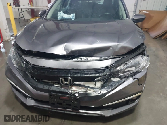2020 Honda Civic EX-L with VIN 19XFC1F70LE010163, listed as a IAAI auction lot 41306532 with 88,767 mi miles and . Bid and sale history available at DreamBid. Image 6.
