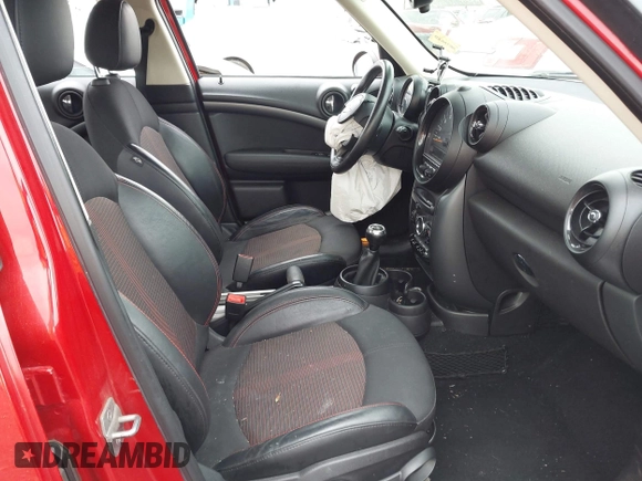 2015 MINI Countryman S with VIN WMWZC3C56FWP53249, listed as a IAAI auction lot 42256130 with 104,415 mi miles and . Bid and sale history available at DreamBid. Image 5.