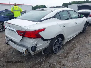 2017 Nissan Maxima SL with VIN 1N4AA6AP2HC421962, listed as a IAAI auction lot 42357374 with 127,450 mi miles and . Bid and sale history available at DreamBid. Image 4.