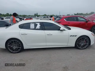 2017 Maserati Quattroporte z VIN ZAM56RPL5H1216548, wystawiony jako IAAI lot #42312258 z przebiegiem 60 709 mil mil oraz . Historia ofert i sprzedaży dostępna na DreamBid. Obrazek 13.