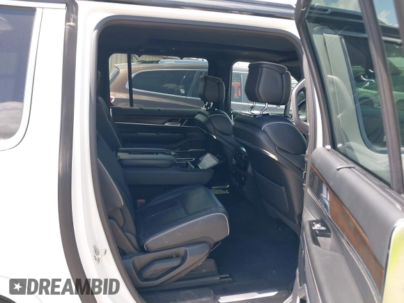 2023 Jeep Grand Wagoneer Series II with VIN 1C4SJSFP7PS530079, listed as a IAAI auction lot 42533407 with 51,178 mi miles and . Bid and sale history available at DreamBid. Image 8.