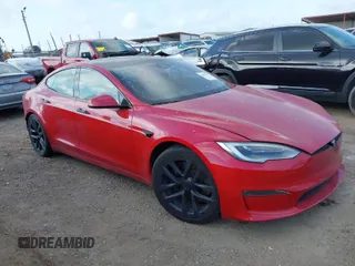 2021 Tesla Model S Plaid with VIN 5YJSA1E60MF447203, listed as a IAAI auction lot 42025120 with 58,190 mi miles. Bid and sale history available at carsss.com. Image 1.