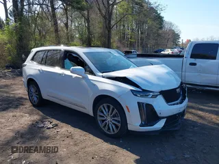 2020 Cadillac XT6 AWD Sport z VIN 1GYKPGRS4LZ151726, wystawiony jako IAAI lot #42093094 z przebiegiem 53 347 mil mil oraz . Historia ofert i sprzedaży dostępna na DreamBid. Obrazek 1.