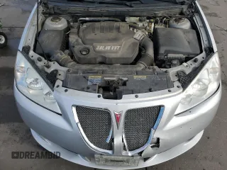 2009 Pontiac G6 with VIN 1G2ZL577094232011, listed as a Copart auction lot 77175054 with 133,353 mi miles and Salvage title. Bid and sale history available at DreamBid. Image 11.