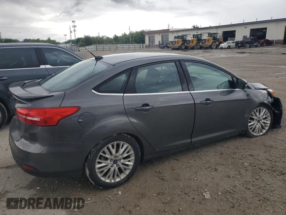 2015 Ford Focus Titanium с VIN 1FADP3J21FL254702, выставлен на аукционе Copart как лот 59872395 с пробегом 93 195 миль миль и Списание • Salvage title. История ставок и продаж доступна на DreamBid. Изображение 3.
