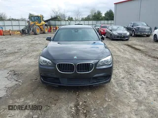 2014 BMW 7 Series 740Li with VIN WBAYE4C56ED138397, listed as a IAAI auction lot 41726117 with 116,291 mi miles. Bid and sale history available at carsss.com. Image 12.