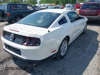 2013 Ford Mustang V6 with VIN 1ZVBP8AM5D5265880, listed as a IAAI auction lot 42617490 with 99,638 mi miles and . Bid and sale history available at DreamBid. Image 4.