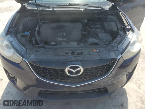 2014 Mazda CX-5 Touring z VIN JM3KE2CYXE0327950, wystawiony jako Copart lot #51390585 z przebiegiem 129 523 mil mil oraz Czysty tytuł • Clean title. Historia ofert i sprzedaży dostępna na DreamBid. Obrazek 12.