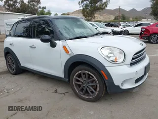 2015 MINI Countryman with VIN WMWZB3C57FWR46707, listed as a IAAI auction lot 42114457 with 137,356 mi miles and . Bid and sale history available at DreamBid. Image 1.