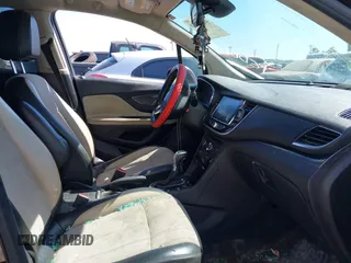2018 Buick Encore Sport Touring with VIN KL4CJ1SB1JB641530, listed as a IAAI auction lot 42057859 with 151,364 mi miles. Bid and sale history available at carsss.com. Image 5.