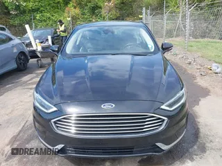 2019 Ford Fusion SEL with VIN 3FA6P0CD5KR182520, listed as a IAAI auction lot 42014190 with 107,028 mi miles and . Bid and sale history available at carsss.com. Image 12.