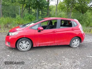 2016 Honda Fit LX with VIN JHMGK5H55GX012649, listed as a IAAI auction lot 42657017 with 82,043 mi miles and . Bid and sale history available at DreamBid. Image 14.
