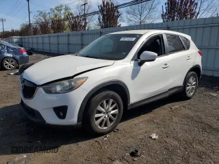 2015 Mazda CX-5 Touring with VIN JM3KE4CYXF0445980, listed as a Copart auction lot 55224355 with 183,713 mi miles and Salvage Title. Bid and sale history available at DreamBid. Image 1.