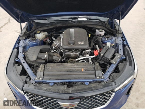 2022 Cadillac CT4 Premium Luxury z VIN 1G6DB5RK8N0131412, wystawiony jako Copart lot #51517555 z przebiegiem 42 705 mil mil oraz Szkoda całkowita • Salvage title. Historia ofert i sprzedaży dostępna na DreamBid. Obrazek 12.