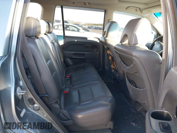 2007 Honda Pilot EX-L with VIN 2HKYF18697H540993, listed as a IAAI auction lot 41243560 with 320,290 mi miles and . Bid and sale history available at DreamBid. Image 8.