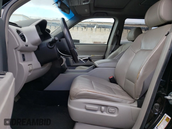 2009 Honda Pilot EX-L with VIN 5FNYF48679B017023, listed as a Copart auction lot 50748695 with 186,273 mi miles and Salvage Title. Bid and sale history available at carsss.com. Image 7.