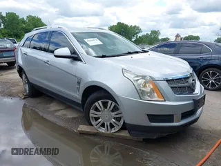 2010 Cadillac SRX Luxury Collection z VIN 3GYFNAEY4AS649479, wystawiony jako IAAI lot #42356570 z przebiegiem 163 606 mil mil oraz . Historia ofert i sprzedaży dostępna na DreamBid. Obrazek 1.