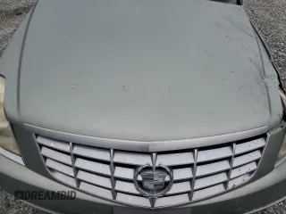2006 Cadillac DTS 1SD z VIN 1G6KD57YX6U193025, wystawiony jako Copart lot #45784605 z przebiegiem Nie podano mil oraz Szkody całkowita. Historia ofert i sprzedaży dostępna na DreamBid. Obrazek 13.