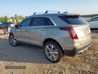 2022 Cadillac XT5 Premium Luxury FWD z VIN 1GYKNERS9NZ120517, wystawiony jako Copart lot #58978045 z przebiegiem 31 456 mil mil oraz Szkoda całkowita • Salvage title. Historia ofert i sprzedaży dostępna na DreamBid. Obrazek 2.