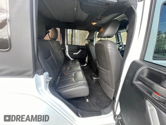 2016 Jeep Wrangler Unlimited 75th Anniversary with VIN 1C4BJWEG5GL215915, listed as a Copart auction lot 52680895 with 143,836 mi miles and Clean title. Bid and sale history available at DreamBid. Image 6.