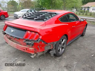 2015 Ford Mustang EcoBoost with VIN 1FA6P8TH7F5411127, listed as a IAAI auction lot 42041294 with 144,067 mi miles and . Bid and sale history available at carsss.com. Image 4.