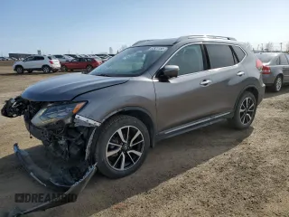 2017 Nissan Rogue SV z VIN 5N1AT2MV9HC856125, wystawiony jako Copart lot #52821155 z przebiegiem 142 209 mil mil oraz Szkoda całkowita • Salvage title. Historia ofert i sprzedaży dostępna na DreamBid. Obrazek 1.