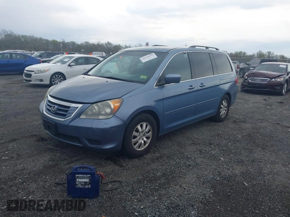 2008 Honda Odyssey EX-L with VIN 5FNRL38748B038328, listed as a IAAI auction lot 42028968 with 243,185 mi miles. Bid and sale history available at carsss.com. Image 2.
