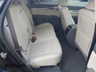 2024 Cadillac XT5 FWD Premium Luxury with VIN 1GYKNCR45RZ733939, listed as a IAAI auction lot 41224515 with 6,945 mi miles. Bid and sale history available at carsss.com. Image 8.