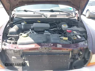 2004 Dodge Dakota SLT with VIN 1D7HG48N24S556431, listed as a IAAI auction lot 42591078 with 213,777 mi miles and . Bid and sale history available at DreamBid. Image 10.